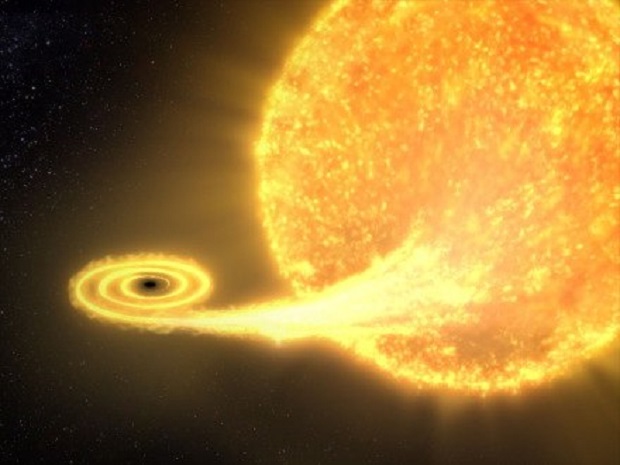 Ученые обнаружили черную дыру, которая проглатывает огромные объекты