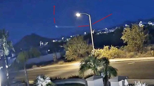 НЛО спускается с неба замеченный камерой видеонаблюдения в Пеории, штат Аризона