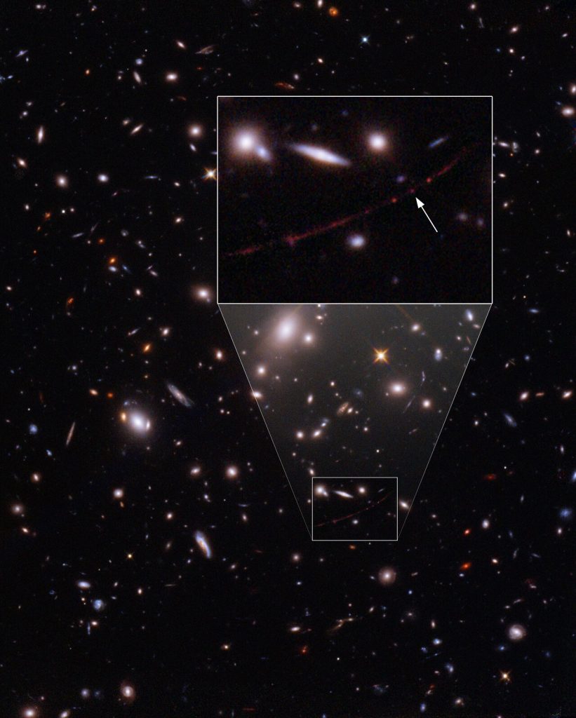 Это местонахождение самой далекой звезды по имени Эарендель, расположенной в уникальной ряби в пространстве-времени, что позволило нам увидеть ее с огромным увеличением из принимающей ее галактики. Авторы и права: НАСА, ЕКА, Брайан Уэлч / JHU, Дэн Коу, Алисса Паган / STScI