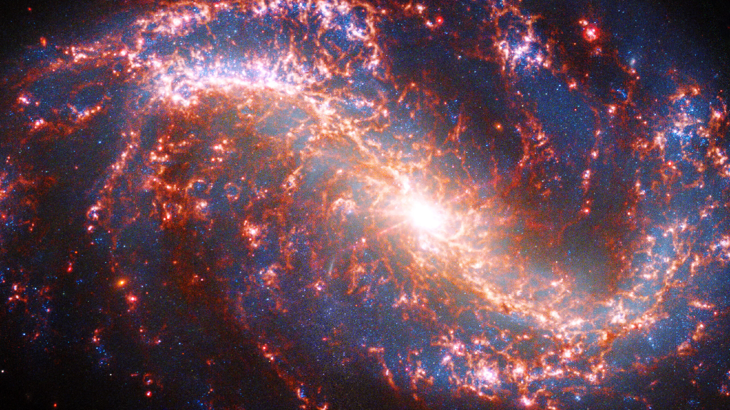 Джеймс Уэбб видит сквозь космическую пыль невиданные ранее звезды в NGC 7496