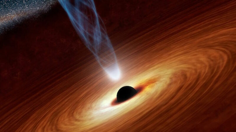 Сверхмассивная черная дыра закручивает канаты плазмы, как космический паук